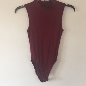 Burgundy sleeveless mock turtleneck bodysuit